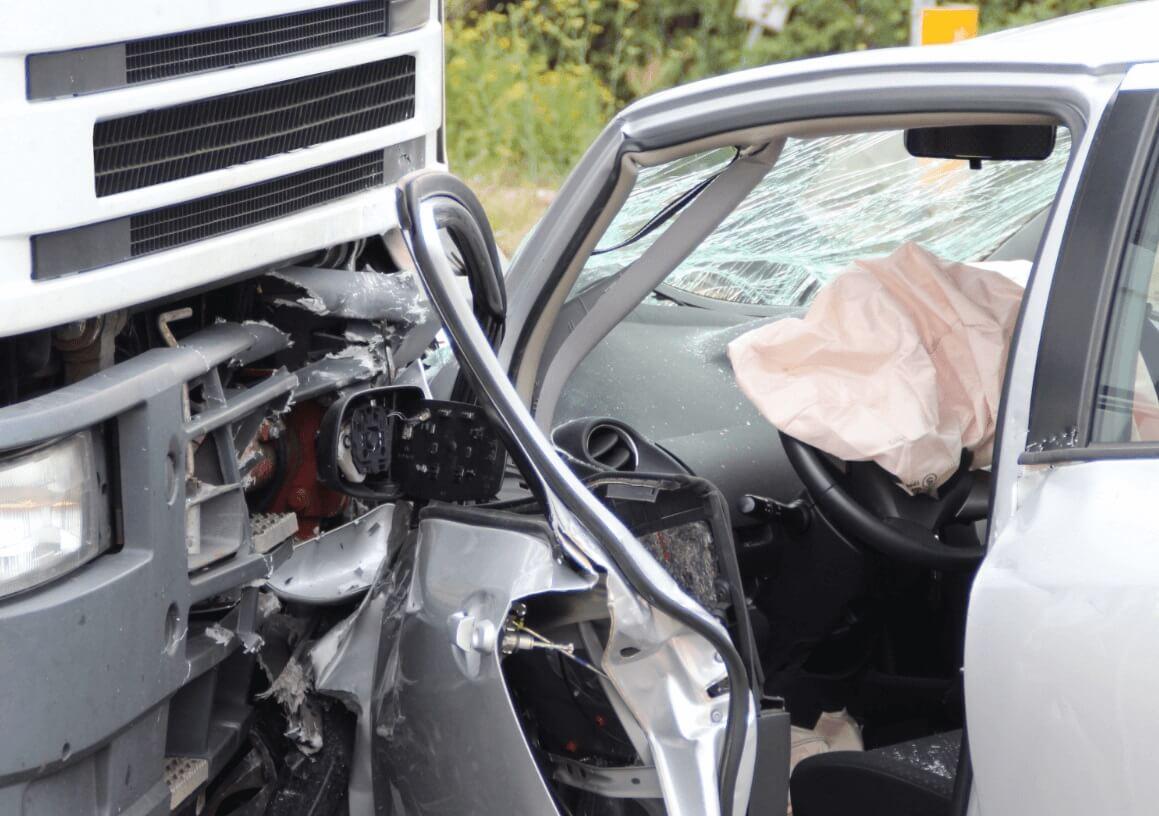 A scene of a car crashing into a bus with airbags deployed, emphasizing a felony-level DUI of Serious Injury by Vehicle